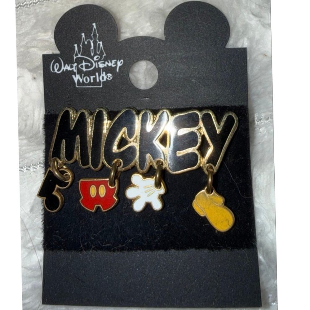 RARE  MICKEY DISNEY TRADING PIN NAMEPLATE  WITH 4 DANGLING PIECES OF CLOTHING